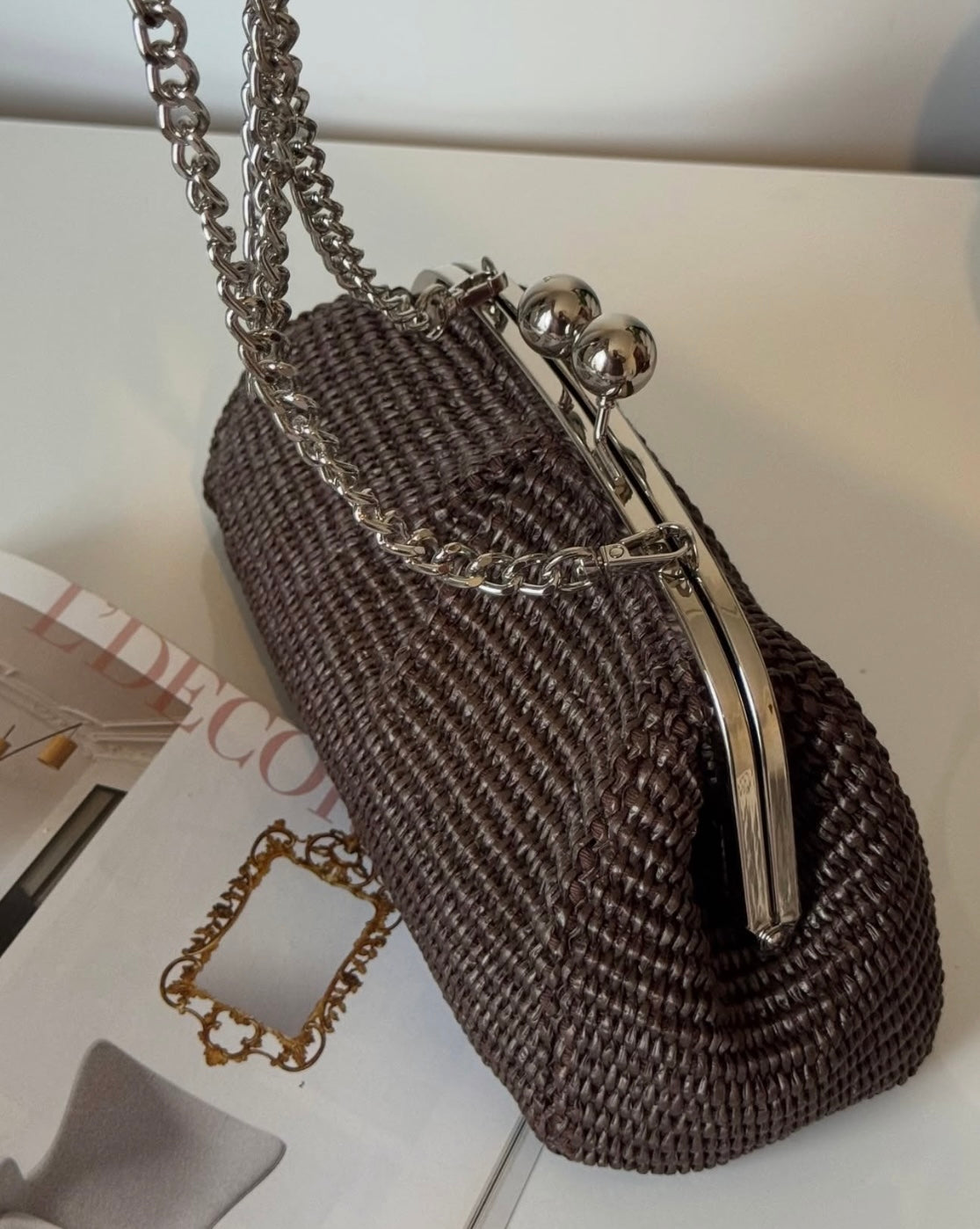 Sac bourse en cuir raphia fermoir clic-clac Meloro